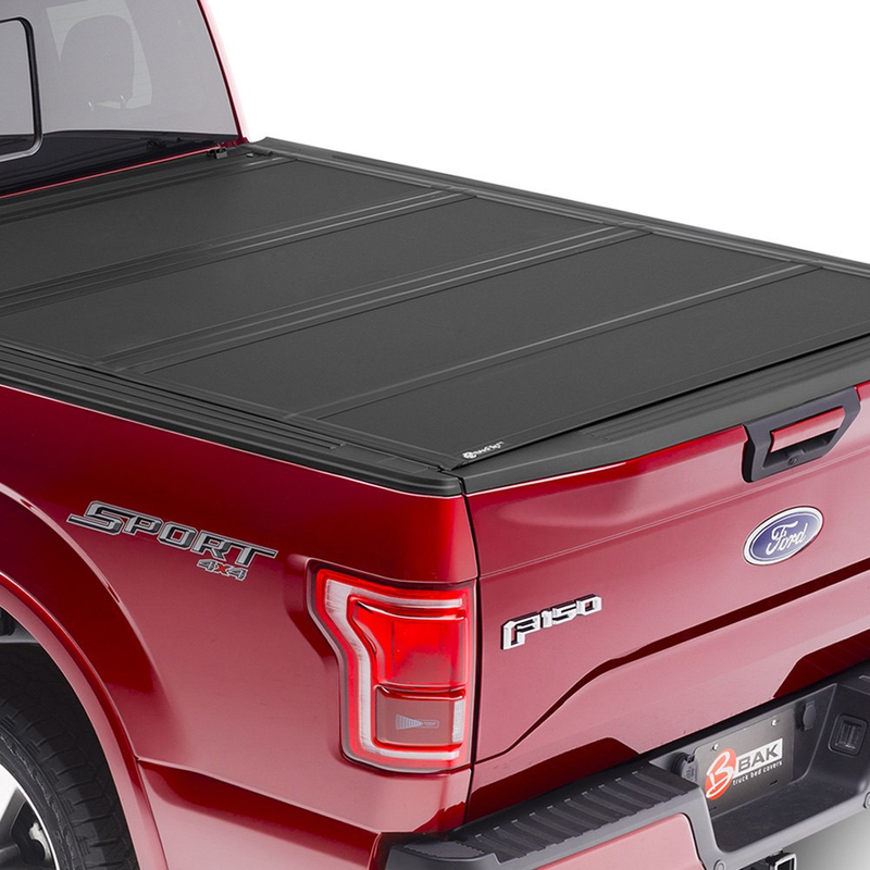 Load image into Gallery viewer, BAK® • 448410T • BakFlip MX4 • Premium Folding Tonneau Cover • Toyota Tundra 6&#39;7&quot; 07-22 with Deck Rail System &amp; without Trail Special Edition Storage Boxes - RACKTRENDZ

