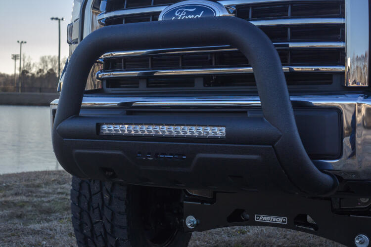 Load image into Gallery viewer, Lund 47121201 - 3.5&quot; Black Steel Bull Bar with Integrated LED Light Bar and with skid plate for Chevrolet Silverado 2500 20-22 - RACKTRENDZ
