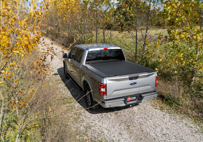 Load image into Gallery viewer, BAK® • 80214 • Revolver X4S • Hard Rolling Tonneau Cover • Ram 1500 09-18 (19-23 Classic) 2500/3500 8&#39; 10-23 with RamBox - RACKTRENDZ
