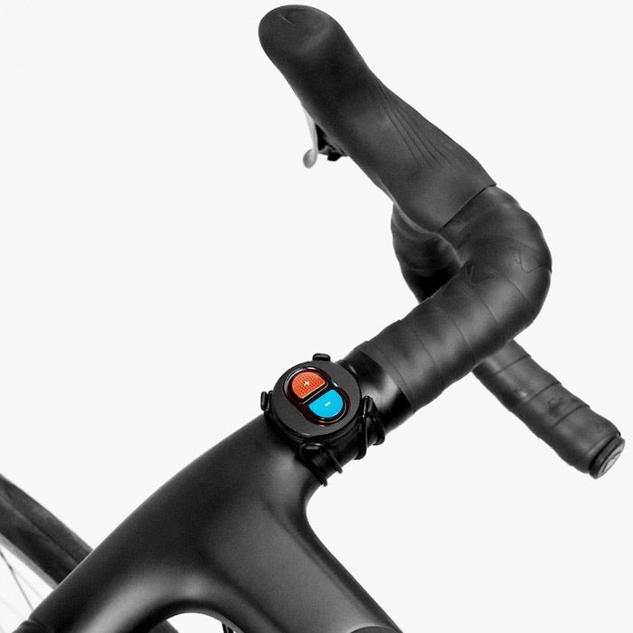 Load image into Gallery viewer, Zwift Click shifter mounted on bike handlebar for virtual shifting
